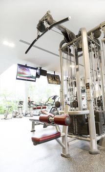 Weight lifting equipments in a club gym.