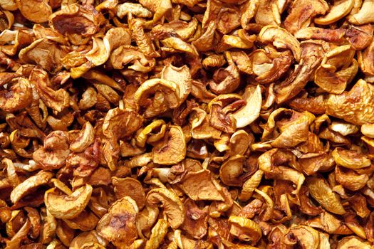 Background of dried slices apples, vegetarian food