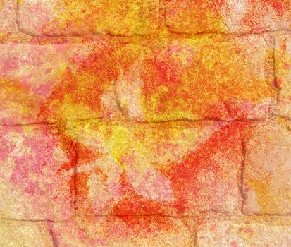 Abstract background, stone pavement and painted leaves