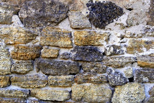 wall of a large rough stone