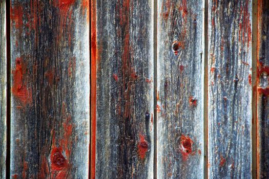  textured on red and gray  wooden surface
