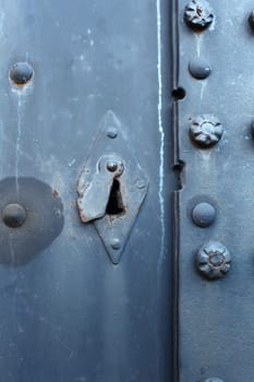 The Old steel door, keyhole closes