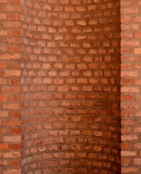 Architectural Feature Of A Curved Red Brick Wall For A Chimney