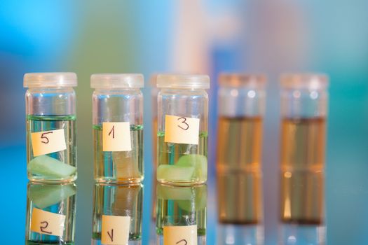 samples in plastic vials for microscopy and biopsy tissue . biological laboratory