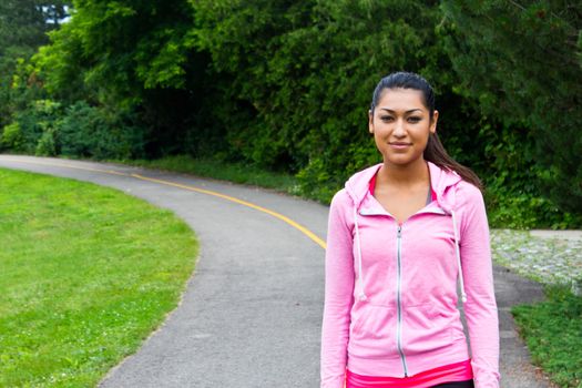 Woman walking on the jogging path