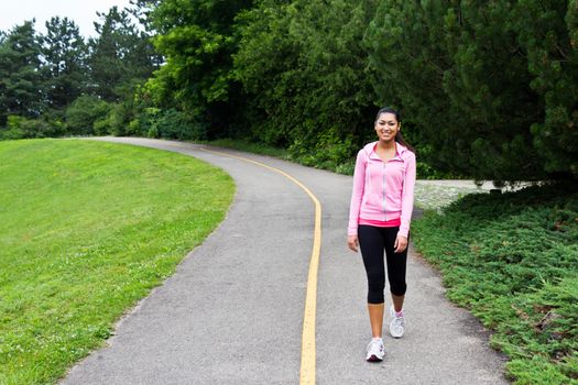 Woman walking on the jogging path