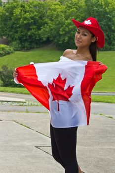 Beautiful girl with a Canada flag