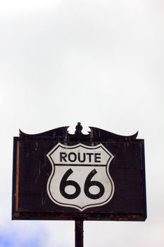 Weathered and Worn Route 66 Road Sign in Vertical