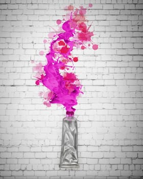 Image of paint tube with color splashes