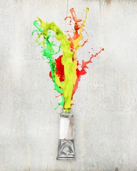 Image of paint tube with color splashes