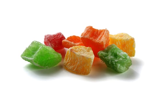 Some isolated coloured candied fruit on the white background