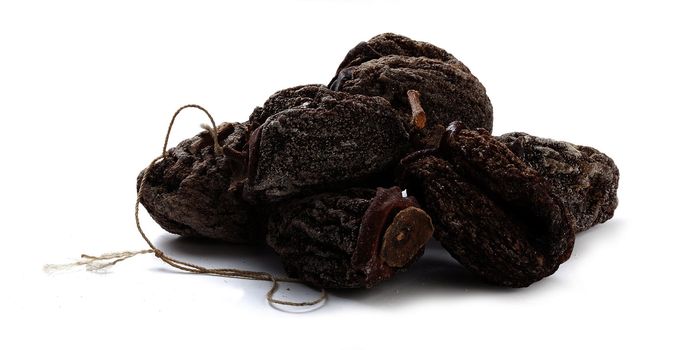 Handfull of dried persimmon on the white background