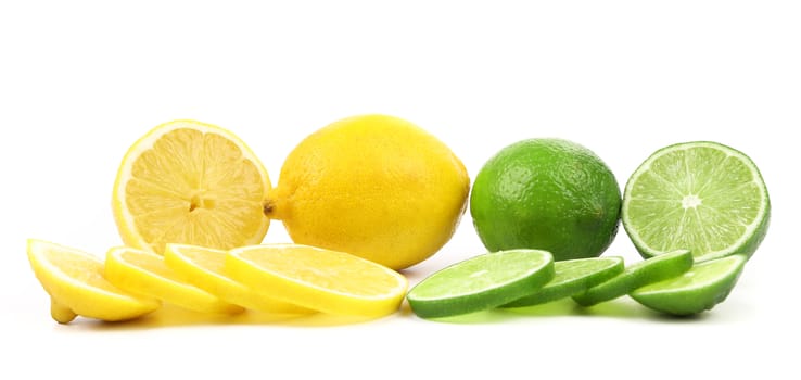 Fresh limes and lemons. Slices.  White background.