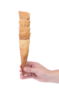 Hand hold stake of wafer cup for ice-cream. White backgroud.