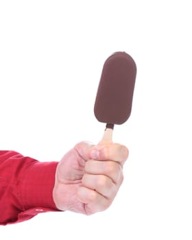 Hand holds chocolate vanilla ice cream. White background.
