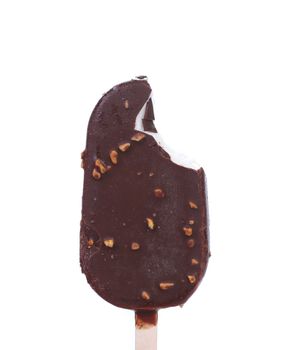 Bitten chocolate-coated blocks of ice cream on stick. White background.