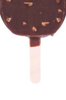 Chocolate-coated blocks of ice cream on stick. White background.