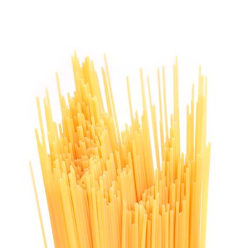 Top uncooked spaghetti. Close up. White background.