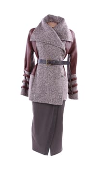 Women's short coat and long skirt. White background.