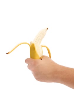 Hand holds opened banana isolated on a white background