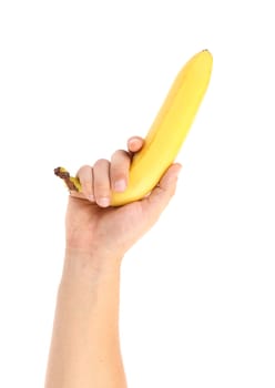 Hand holds banana isolated on a white background