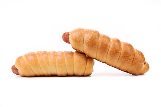 Two hot dog baked. Close up. White background.