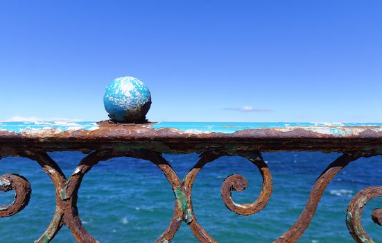 rusty balustrade on the sea front