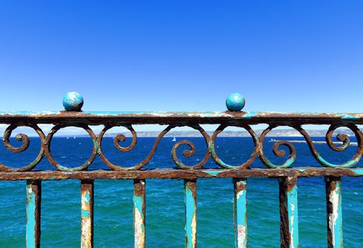 rusty balustrade on the sea front