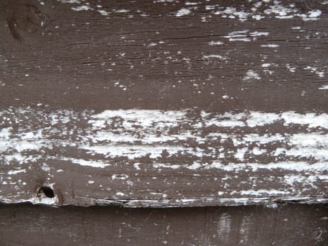 Weathered brown wood from a fence panel