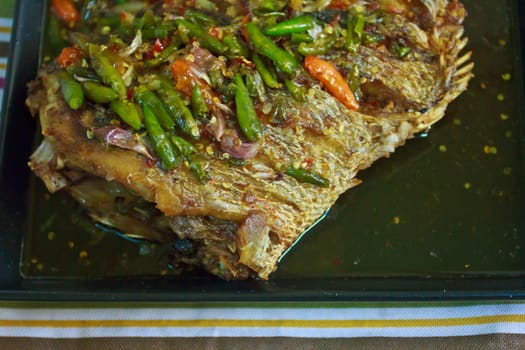 fried fish with garlic and chili