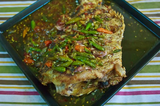 fried fish with garlic and chili
