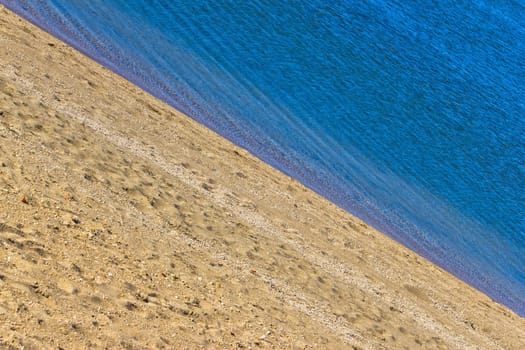 Sand beach and blue sea diagonal layers