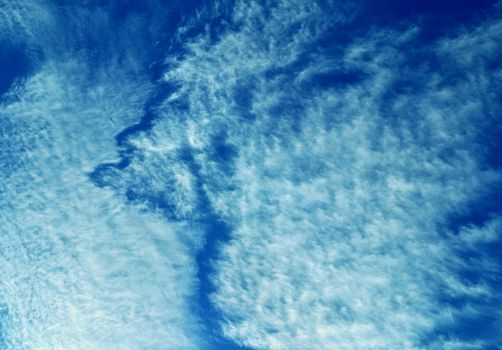 romantic background or texture of white clouds on blue