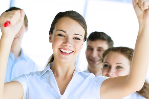 Successful business woman receiving congratulations from his colleagues, business success