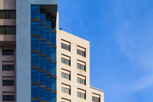 Exterior of luxury building hotel with modern architecture with blue sky