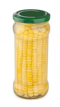 Preserved corncob in the glass jar on the white