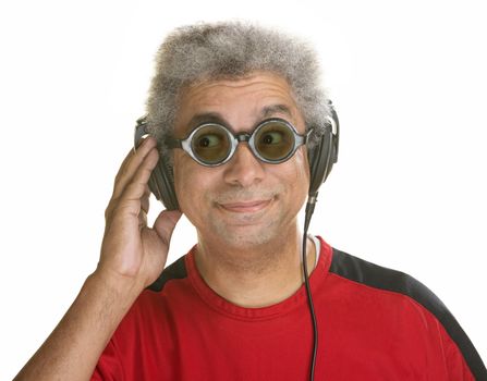 Interested mature male with sunglasses and headphones