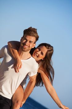 attractive young couple in love having fun in summer holidays vacation