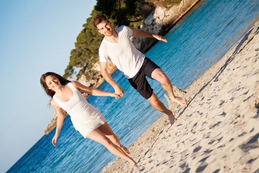 happy young couple having fun in summer holiday vacation love