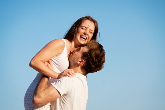 happy young couple having fun in summer holiday vacation love