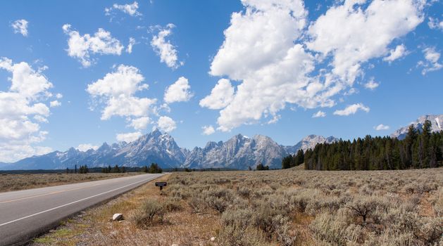 The Teton Range is a mountain range of the Rocky Mountains in North America. A north-south range, it is mostly on the Wyoming side of the state's border with Idaho, just south of Yellowstone National Park.