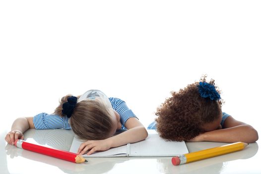 Little girls sleeping in the classroom