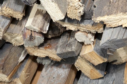 Stack of beech chopped firewoods prepared for firing