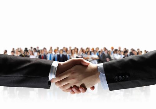Handshake of business people with people at background
