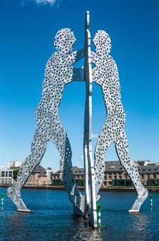 sculpture called The Molecule Men in Berlin