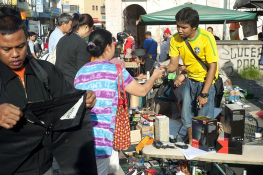 Kuala Lumpur, Malaysia - May 12, 2013: Unidentified people at flee market in Chinatown in Kuala Lumpur. About 44%, of Kuala Lumpur population are the Chinese.