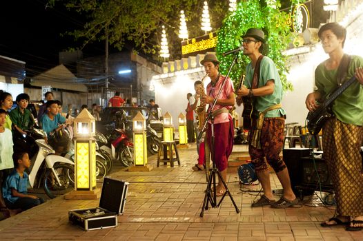 Lopburi, Thailand - Feb 23, 2013: Unidentified street musicians performing during the land of King Narai festival  in Lopburi, Thailand