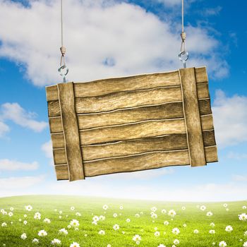 Wooden blank banner hanging on ropes. Place for text