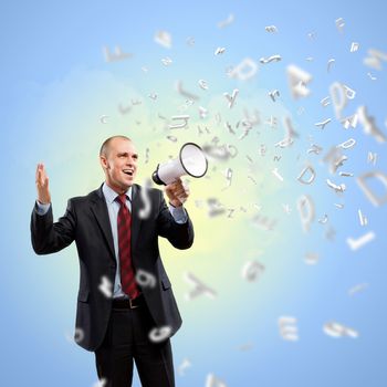 Image of angry businessman screaming in megaphone