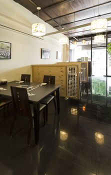 Vertical shot of the interior of a Korean Restaurant.